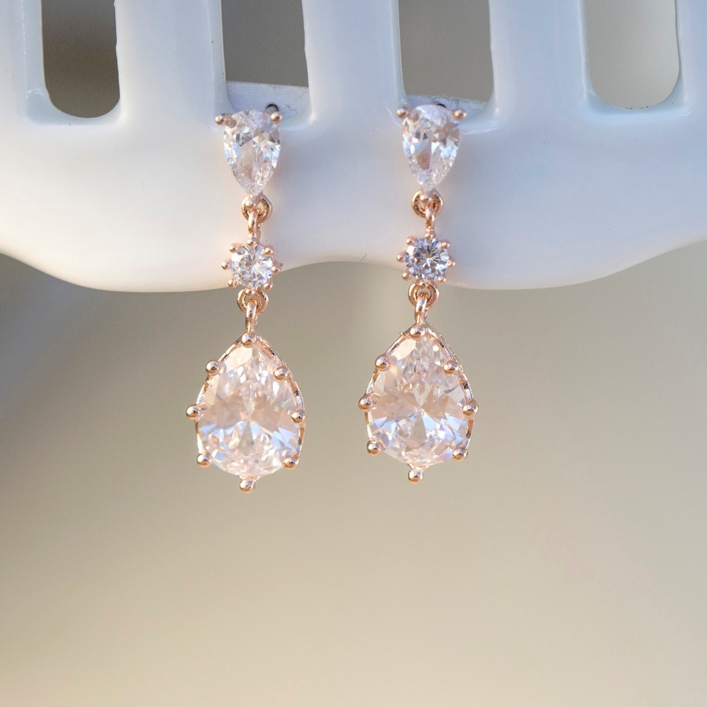 Dangling rose gold teardrop crystals earrings